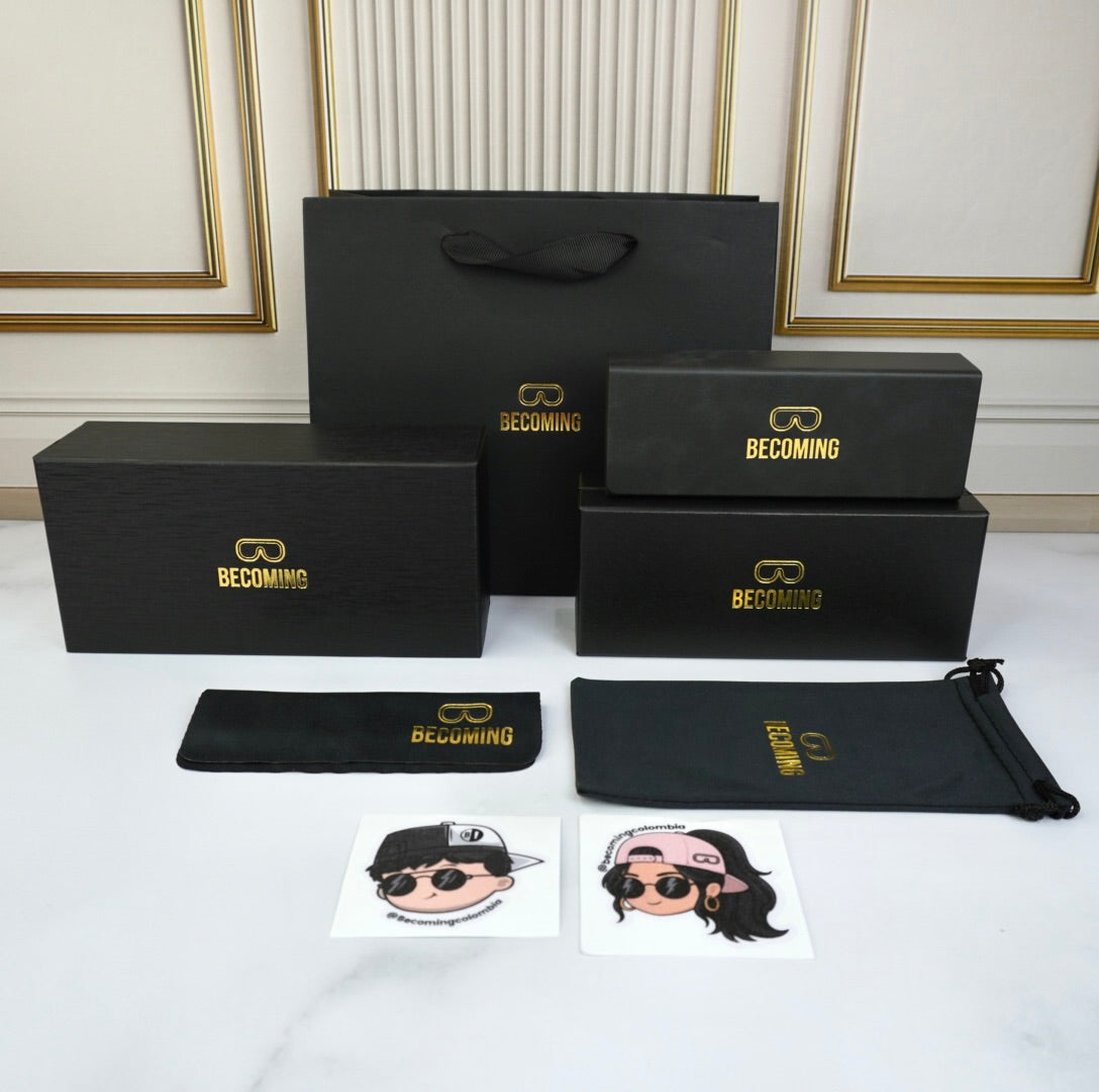 Empaque de lujo Becoming: caja exterior, caja de presentación, estuche rígido, funda de microfibra, paño y stickers